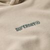 Φαρδιά φούτερ με κουκούλα και μικρό λογότυπο Φαρδιά φούτερ με κουκούλα και μικρό λογότυπο