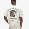 Φαρδύ T-shirt με σχέδιο τατουάζ στην πλάτη