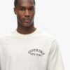Φαρδύ T-shirt με σχέδιο τατουάζ στην πλάτη