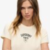 Στενό T-shirt με τατουάζ και στρας Στενό T-shirt με τατουάζ και στρας